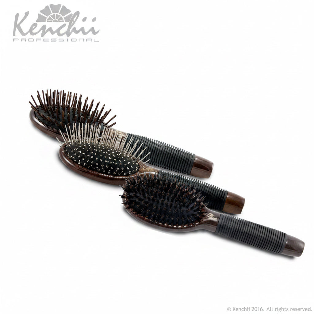 Set of Kenchii professional hairbrushes on a white background